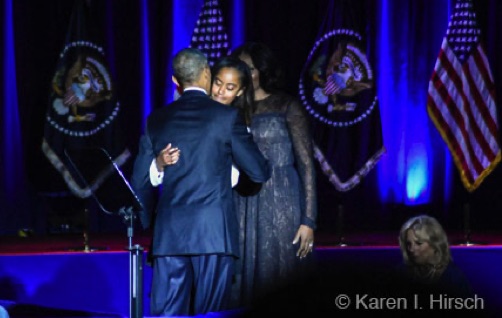 Melia Obama hugs her dad