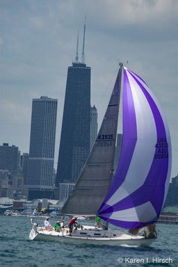 Sailboat with spinnakers at start of Race to Mackinac