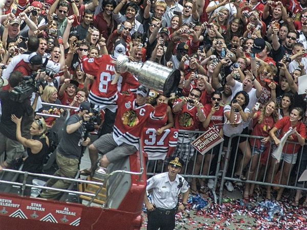 Chicago Black Hawks raising Stanley Cup in Parade