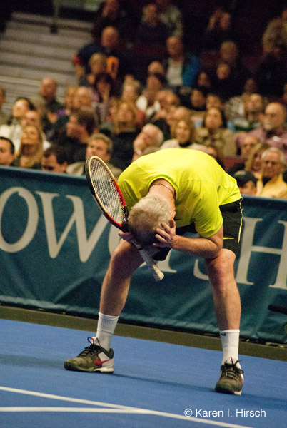 John McEnroe in despair after lost point during tennis match